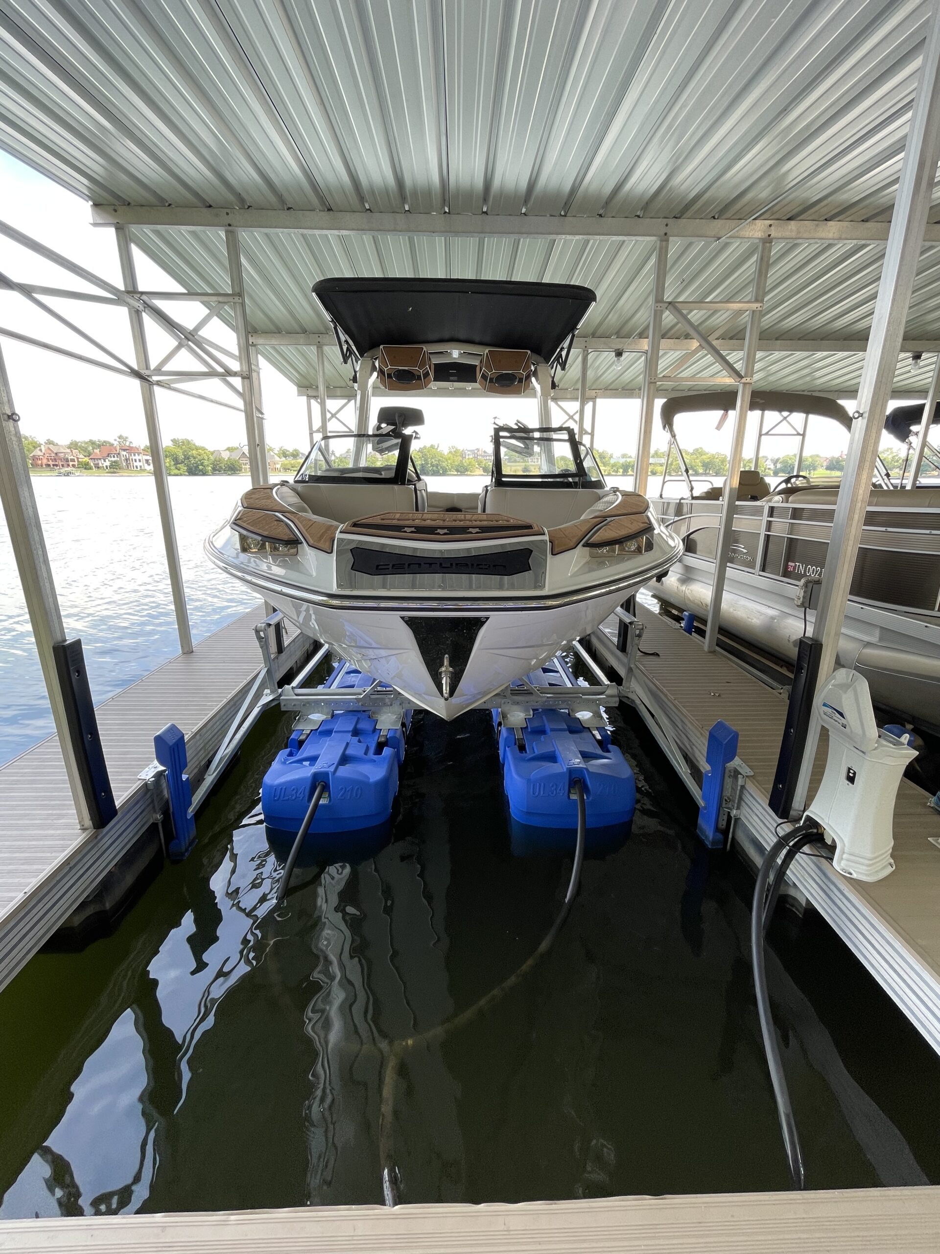 HydroHoist boat lift installation on covered dock in Tennessee