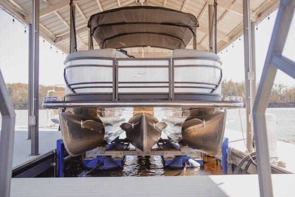 Pontoon boat on HydroHoist boat lift